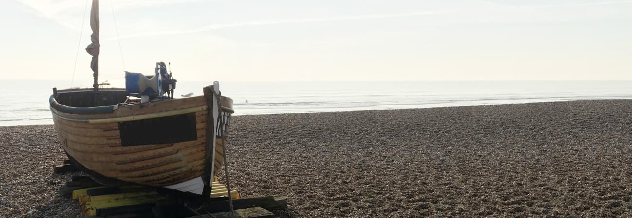 A fishing boat on the beach at Bexhill on Sea